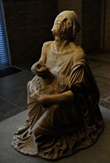 Drunken old woman. Roman sculpture after original of about 2 Drunken old woman. Roman sculpture after original of about 2