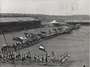 Dutch boy scouts on a parade ground with flags Dutch boy scouts on a parade ground with flags