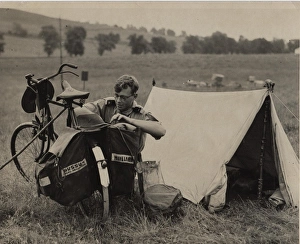 Dutch rover scout with bicycle and tent Dutch rover scout with bicycle and tent