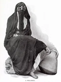 Egyptian woman from Cairo wearing traditional clothing. Date: 1902 Egyptian woman from Cairo wearing traditional clothing. Date: 1902