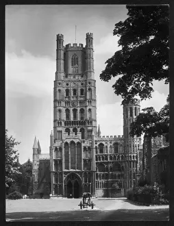 Prints of The beautiful Western Tower of Ely Cathedral, Cambridgeshire, England, a landmark across the surrounding Fen Country Cambridgeshire Prints: Ely Cathedral Western Tower Print