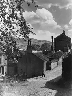 Prints of Luddenham village, near Halifax, Yorkshire, England. It was the Lord Nelson public house that Branwell Bronte frequented while working as a railway clerk Date: 1950s Halifax Prints: Luddenham Village Print, Yorkshire England circa 1950s