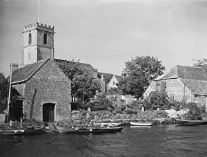 Prints of Wareham, Dorset, England, with its Norman church, on the banks of the River Frome. Date: 1960s Wareham Prints: Wareham, Dorset, England Print 1960s