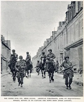 The entry of American paratroops into St. Mere Eglise, Normandy, shortly after D-Day The entry of American paratroops into St. Mere Eglise, Normandy, shortly after D-Day