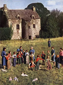 Evacuees in the grounds of their Hostel Evacuees in the grounds of their Hostel
