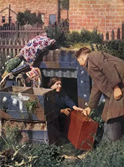 A Family emerging from the Anderson Shelter A Family emerging from the Anderson Shelter