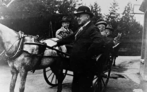 Family with horses, Huntsworth Mews, Marylebone, London Family with horses, Huntsworth Mews, Marylebone, London