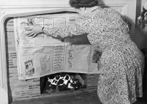 Fanning a Fire Print: Woman and Coal Fire