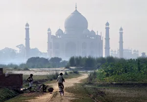 Farm boys play on land on the opposite side of River Jumna Farm boys play on land on the opposite side of River Jumna