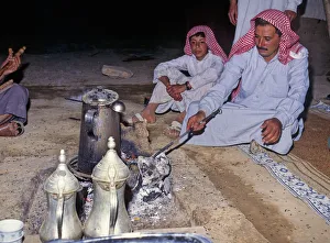Father and son in Bedouin tent, Syria Father and son in Bedouin tent, Syria