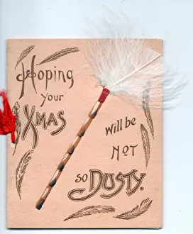 Feather duster with comic greeting on a Christmas card Feather duster with comic greeting on a Christmas card