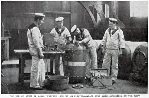 Filling an electro-contact mine with gun-cotton in the Navy. Date: August 1914 Filling an electro-contact mine with gun-cotton in the Navy. Date: August 1914