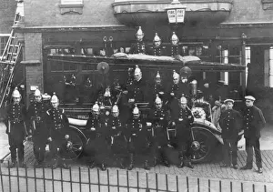 Historical Firefighting Equipment Prints: Firefighters and fire engine posing outside station
