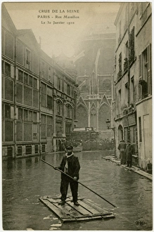 Flooding in Paris - Parisian punting down Rue Massillon Flooding in Paris - Parisian punting down Rue Massillon