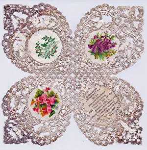 Flowers on a paper lace Christmas and New Year card Flowers on a paper lace Christmas and New Year card