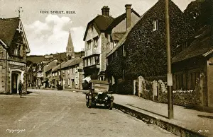 Prints of Fore Street, Beer, near Seaton, Devon, England. Showing a Bullnose Morris Vintage Car Date: 1920s Seaton Prints: Fore Street, Beer, Devon Print with Vintage Bullnose Morris Car