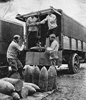 French artillery shells being loaded for transport French artillery shells being loaded for transport