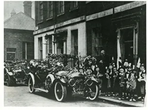 Two garlanded Napier's carrying Welsh schoolchildren Two garlanded Napier's carrying Welsh schoolchildren