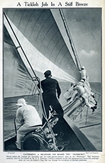 Gathering headsail on board Hamburg at Cowes, IOW Gathering headsail on board Hamburg at Cowes, IOW