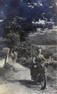 Gentleman & pillion rider on 1930s Ariel motorcycle Gentleman & pillion rider on 1930s Ariel motorcycle