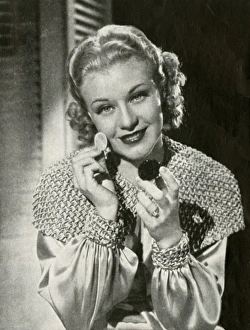Ginger Rogers, applying Max Factor make up Ginger Rogers, applying Max Factor make up