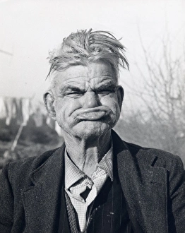 Gipsy man pulling a gurning face, Lewes, Sussex Gipsy man pulling a gurning face, Lewes, Sussex