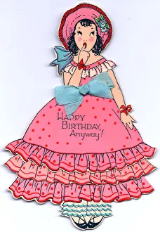 Girl in a frilly pink dress on a cutout birthday card Girl in a frilly pink dress on a cutout birthday card