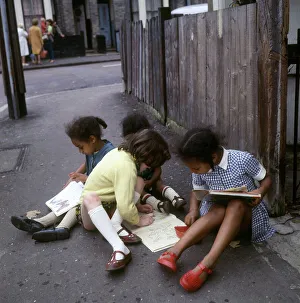 Girls with their books in Balham, SW London Girls with their books in Balham, SW London