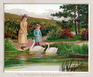 Two girls and two swans on a Christmas card Two girls and two swans on a Christmas card