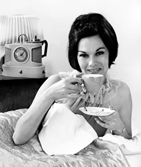 A glamorous female model with her trusty Goblin Teasmade A glamorous female model with her trusty Goblin Teasmade