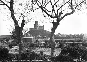 Prints of A Glimpse of the Moat, Donaghadee - a view over allotments towards the moat on the hill. (Location: Northern Ireland: County Down: Donaghadee). Date: circa early 1900s Donaghadee Prints: Donaghadee Moat Print circa Early 1900s