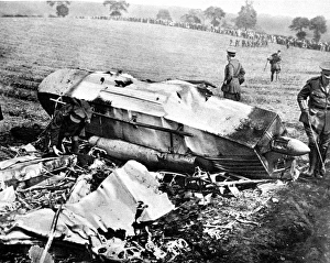 A gondola, part of a crashed zeppelin, being examined by the A gondola, part of a crashed zeppelin, being examined by the