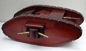 Great War wooden money box in the form of a WWI tank Great War wooden money box in the form of a WWI tank