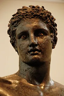 Greek Art. Greece. 4th century BCE. Bronze statue of a youun Greek Art. Greece. 4th century BCE. Bronze statue of a youun