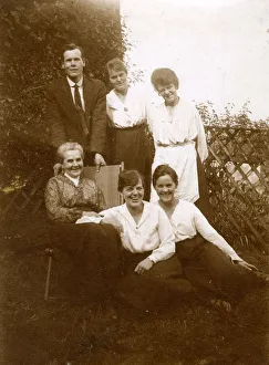 Group photo, family of six in a garden Group photo, family of six in a garden