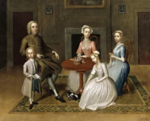 Group portrait, possibly of the Brewster family, in a domest Group portrait, possibly of the Brewster family, in a domest