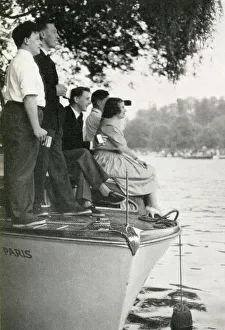 Group watching the Henley Regatta from boat, July 1958 Group watching the Henley Regatta from boat, July 1958
