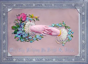 Hands and flowers on a birthday card Hands and flowers on a birthday card