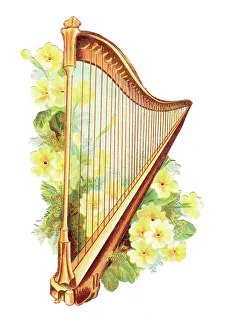 Harp with yellow flowers on a cutout greetings card Harp with yellow flowers on a cutout greetings card