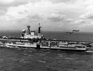 Two Harriers manoeuvre into position for landing on the deck Two Harriers manoeuvre into position for landing on the deck