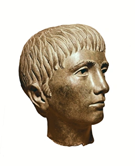 Head of young boy. 3rd BC. Etruscan art. Sculpture Head of young boy. 3rd BC. Etruscan art. Sculpture