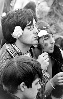 Hippy man with flowers at Woburn Park Hippy man with flowers at Woburn Park
