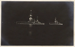 HMS Marlborough and HMS Ajax illuminated at night HMS Marlborough and HMS Ajax illuminated at night