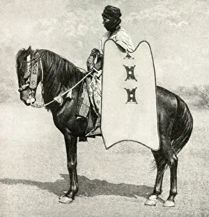 Horse and rider, Sokoto, Nigeria, West Africa Horse and rider, Sokoto, Nigeria, West Africa