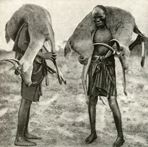 Huntsmen with game, Tanganyika, East Africa Huntsmen with game, Tanganyika, East Africa