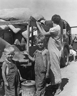Part of an impoverished family of nine on a New Mexico highw Part of an impoverished family of nine on a New Mexico highw