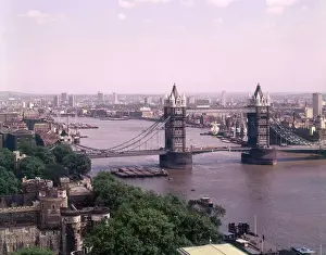 Tower Of London Image Prints: An impressive elevated view of Tower Bridge and the River Thames, London, looking east
