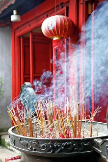 Incense sticks burning in Den Ngoc Son, Temple Hanoi Incense sticks burning in Den Ngoc Son, Temple Hanoi