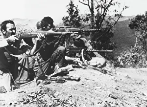 Prints of Infantrymen of the U.S. Mars Task Force unit attack Japanese troops in the Burma Road Sector, 80 miles north of Lashio Myanmar Prints: 1944 U.S. Mars Task Force Burma Road Print