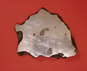 Prints of This meteorite is the product of atmospheric melting, as are stony achondrites. Specimen held at the Natural History Museum, London Natural History Museum Prints: Iron Meteorite Print - Atmospheric Melting Specimen